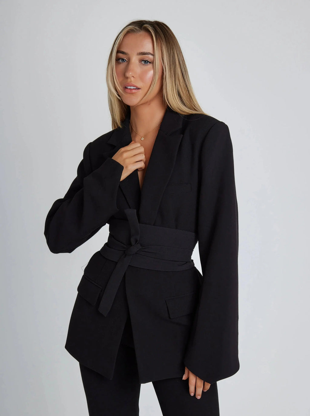 Tailored Blazer with Belt, Wide Lapels, and Sleek Design