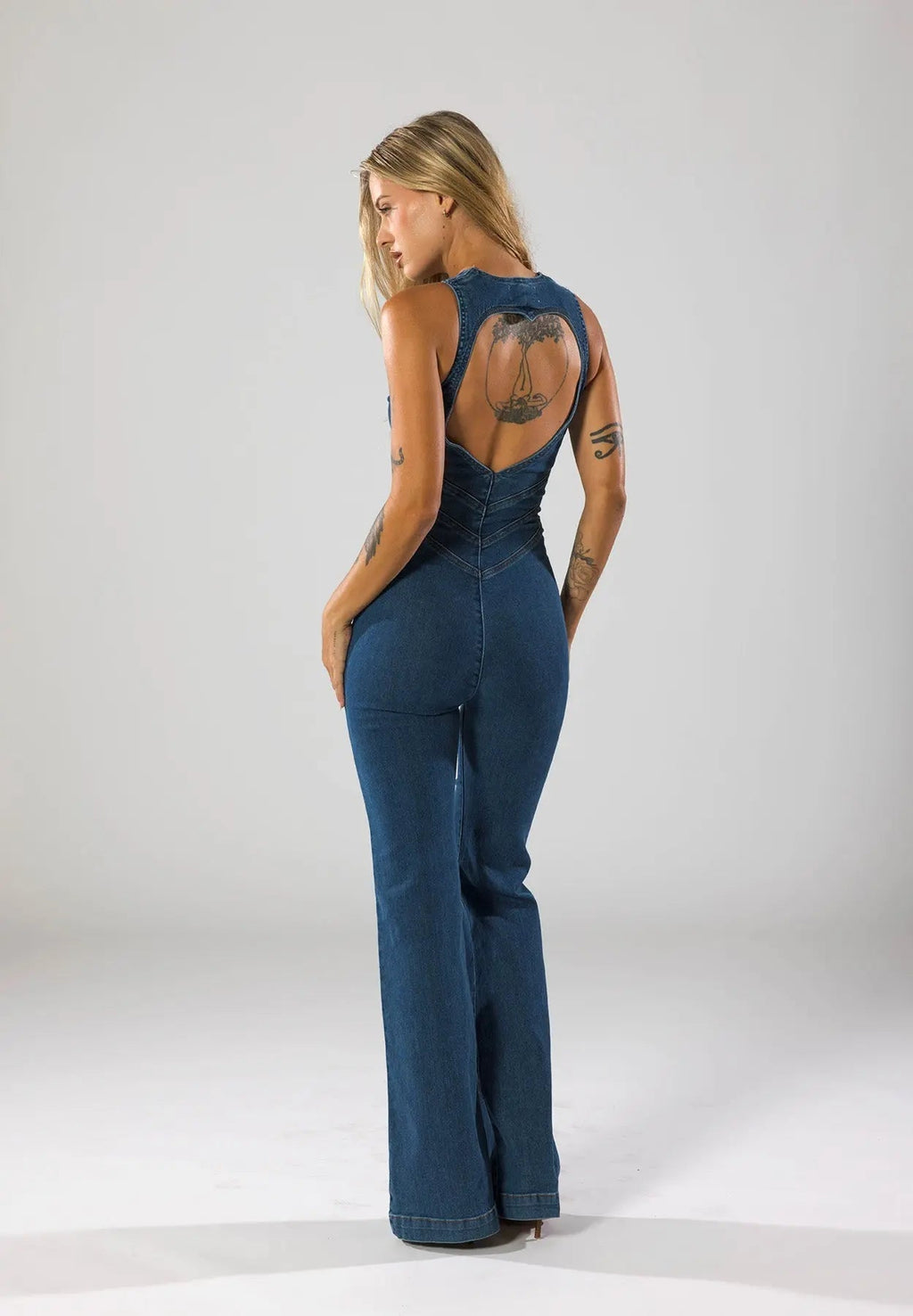 Flared Leg Denim Jumpsuit with Deep V-Neck