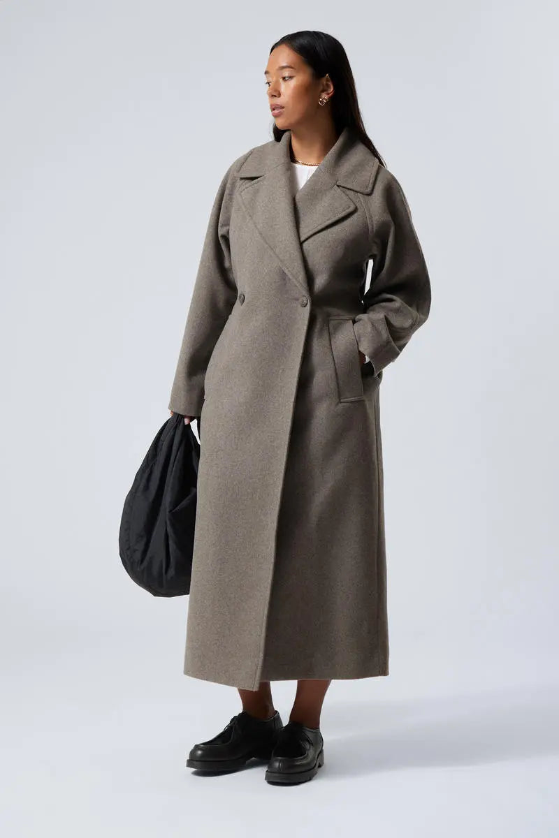 Spacious Wool Overcoat with Double-Breasted Style and Lapel Collar