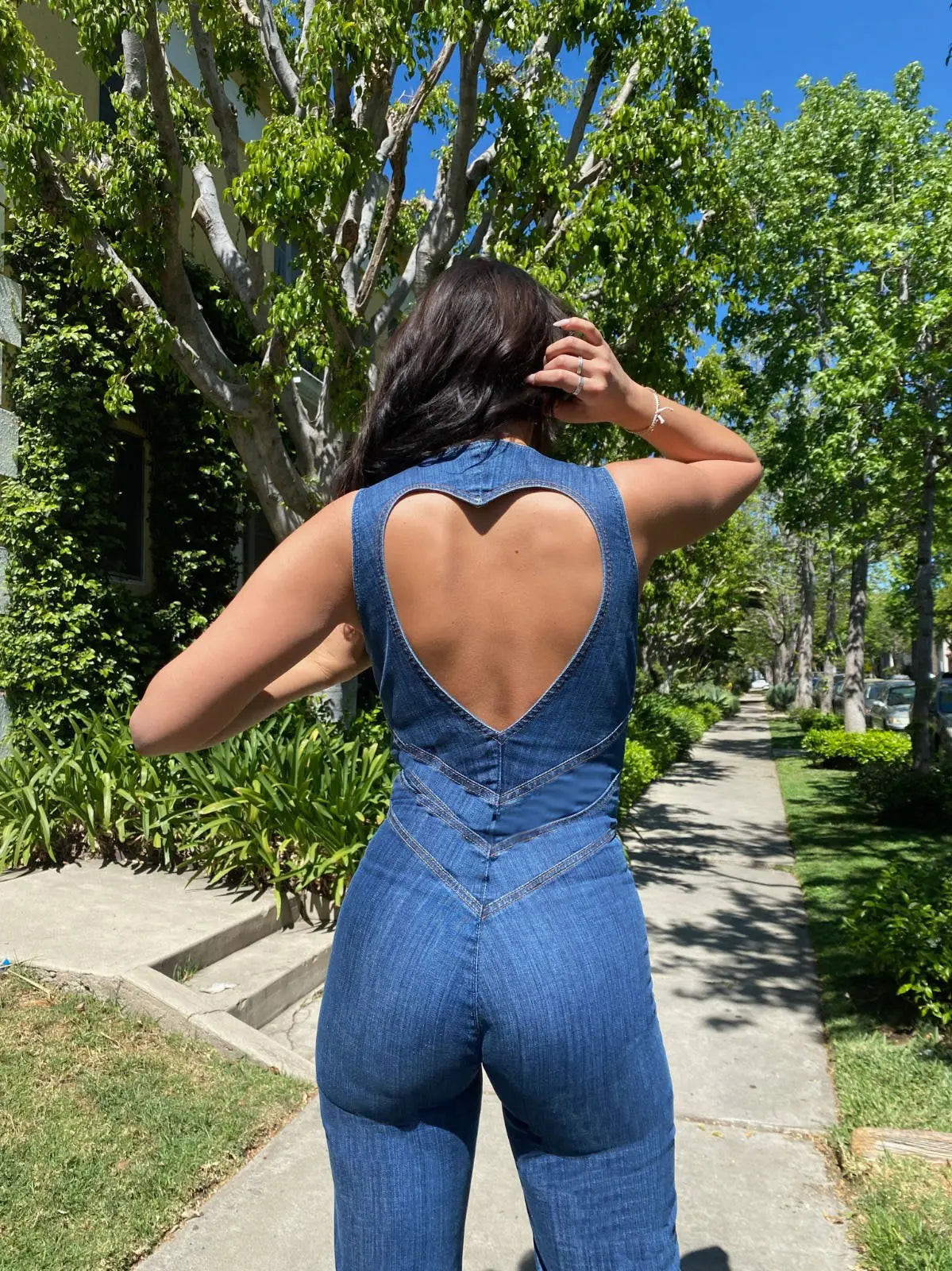 Flared Leg Denim Jumpsuit with Deep V-Neck