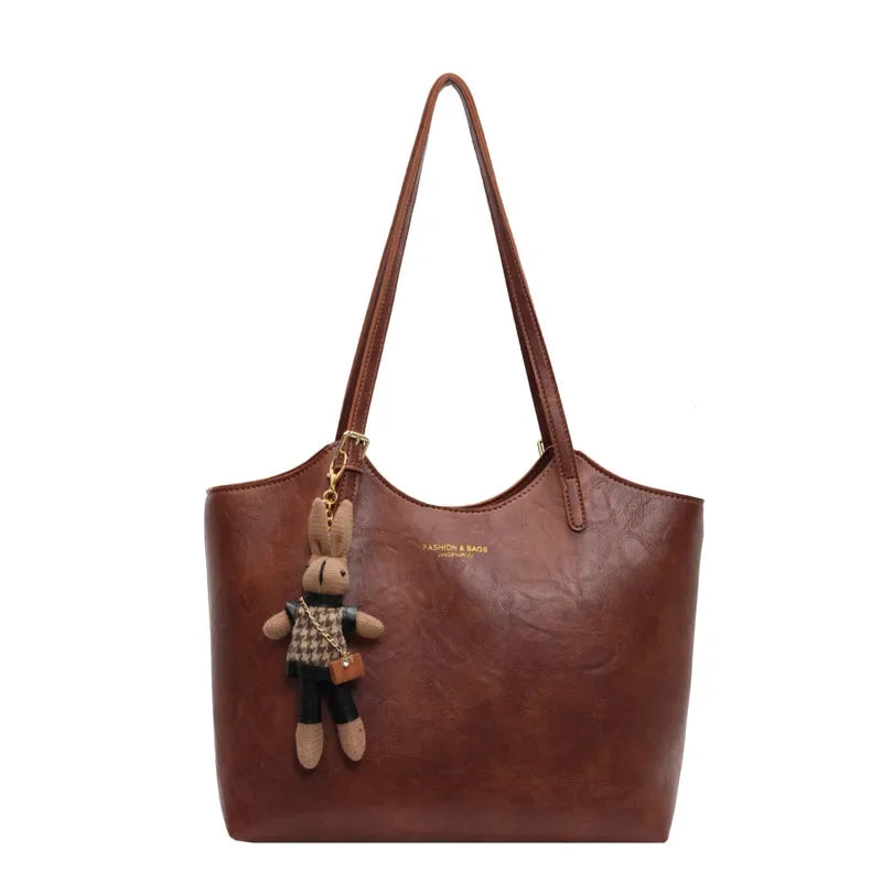 Soft Vegan Leather Tote Bag with Shoulder Straps and Plush Charm