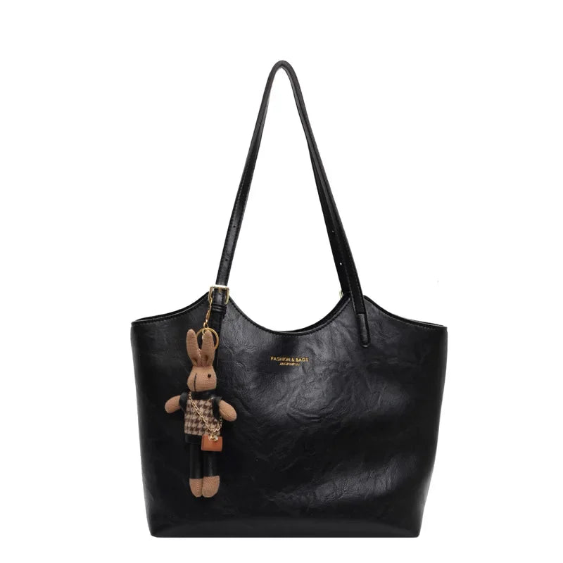 Soft Vegan Leather Tote Bag with Shoulder Straps and Plush Charm