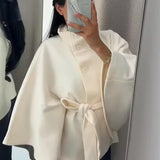 Sophisticated Belted Cape Jacket with High Neck
